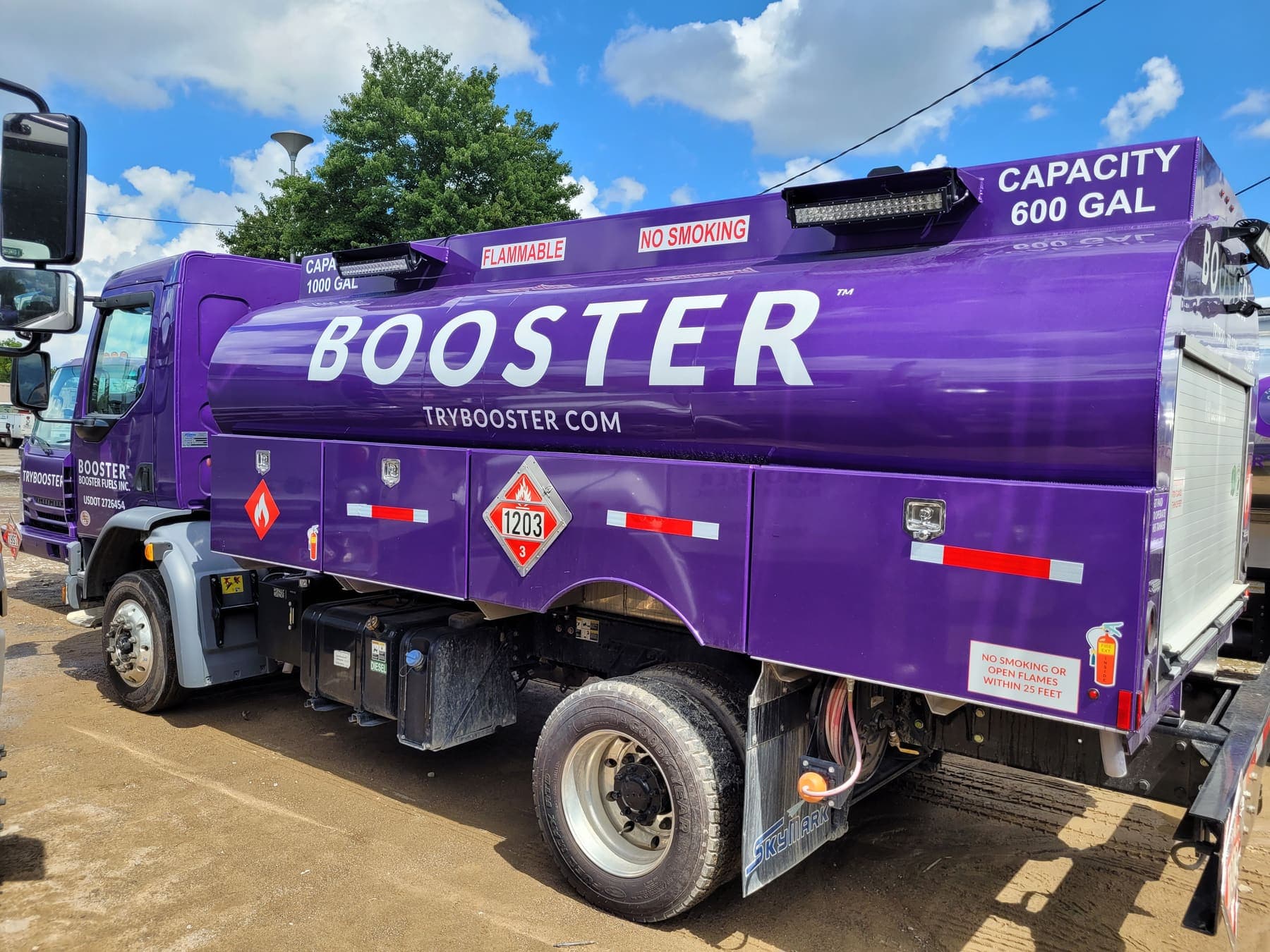 Purple Booster fuel tanker truck wrap